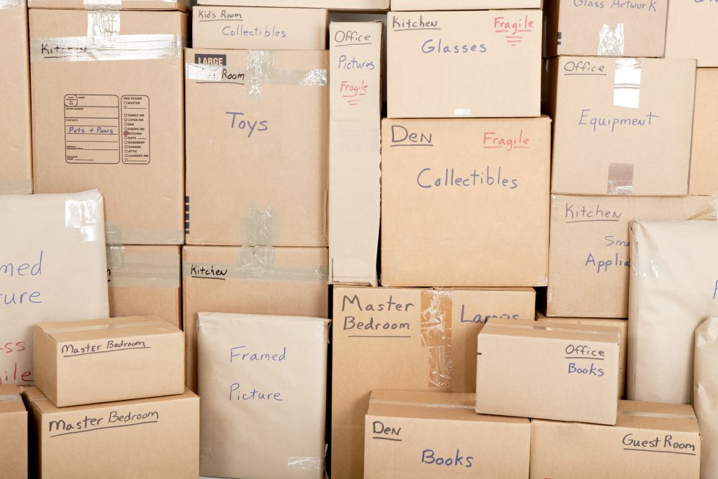 Wall with boxes labeled and ready for shipping Wall with boxes labeled and ready for shipping